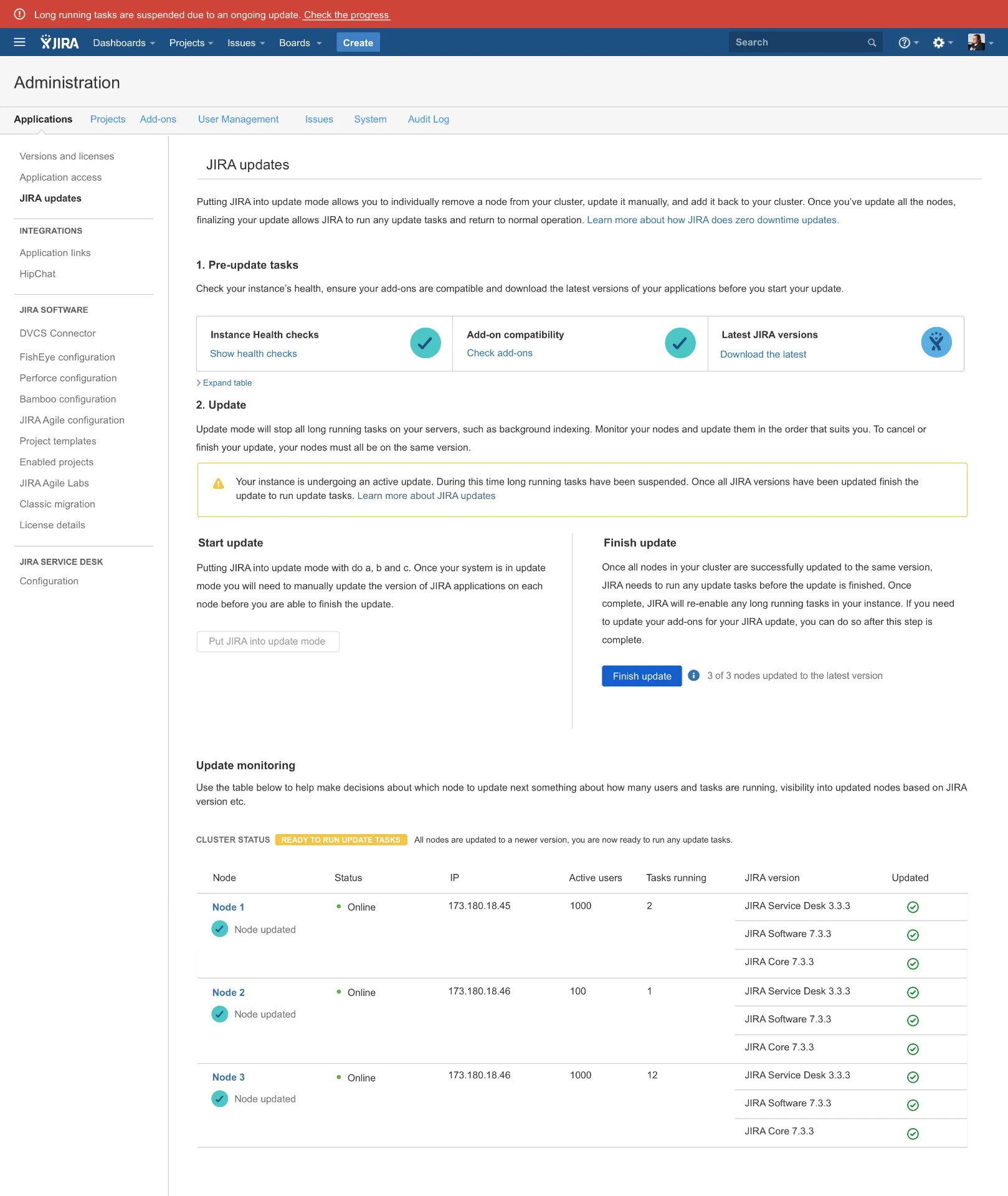 Jira Data Center 'JIRA updates' administration page in the ready-to-finish state: a red suspended-tasks banner, a yellow active-update warning box, all three nodes online and marked 'Node updated' with matching newer JIRA versions, a 'READY TO RUN UPDATE TASKS' cluster-status badge, and a 'Finish update' button showing '3 of 3 nodes updated to the latest version'.